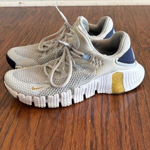 Women’s Nike Gray Blue and Gold Metcon Size 7